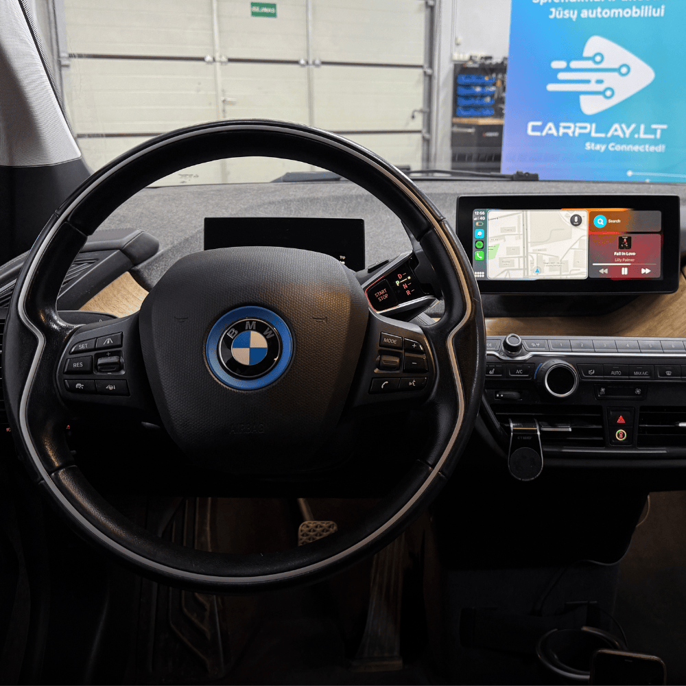 Apple Carplay is integrated in the BMW I3 without replacing the original head unit