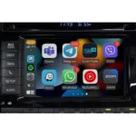 Toyota Land Cruiser Apple CarPlay display showing apps like Teams, Telegram, Waze, and WhatsApp.