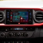 Toyota Tacoma dashboard with Apple CarPlay navigation.