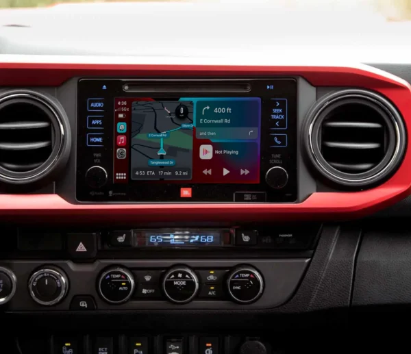 Toyota Tacoma dashboard with Apple CarPlay navigation.
